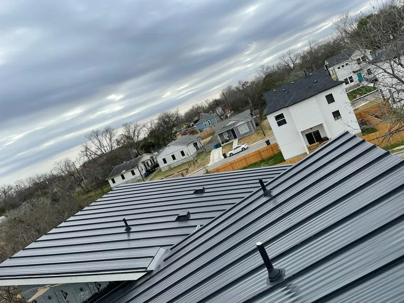 Standing seam metal roof panels with vents for Skylight Repair in Glen Ellyn